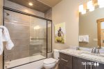 En-suite bathroom with bath tub/shower combo